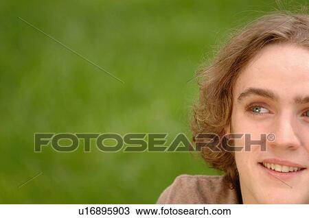 Portrait of young man in park, Regina, Saskatchewan View Large Photo Image Stock Image - Portrait of young man in park, Regina, Saskatchewan. Fotosearch