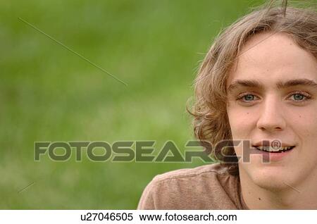 Portrait of young man in park, Regina, Saskatchewan View Large Photo Image Stock Photography - Portrait of young man in park, Regina, Saskatchewan. Fotosearch