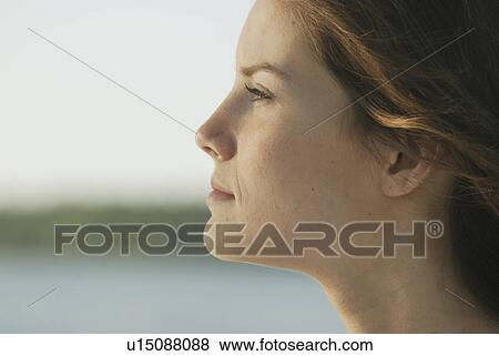 Profile of young woman outdoors, Clear Lake, Riding Mountain National Park, Manitoba, Canada View Large Photo Image Stock Photo - Profile of young woman outdoors, Clear Lake, Riding Mountain National Park, Manitoba, Canada. Fotosearch