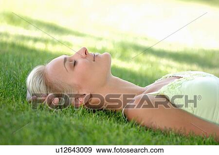 Young blonde female in park, Regina, Saskatchewan View Large Photo Image Stock Photo - Young blonde female in park, Regina, Saskatchewan. Fotosearch