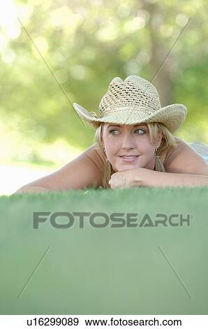 Young blonde female in park with hat, Regina, Saskatchewan View Large Photo Image Stock Photo - Young blonde female in park with hat, Regina, Saskatchewan. Fotosearch