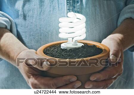 Energy-saving light bulb. View Large Photo Image Picture - Energy-saving light bulb.. Fotosearch