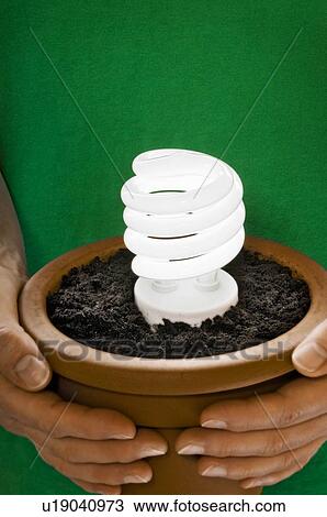 Energy-saving light bulb. View Large Photo Image Stock Image - Energy-saving light bulb.. Fotosearch