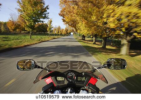 Stock Photo - View on Motorcycle in action, Eastern Townships, Quebec, Canada. Fotosearch