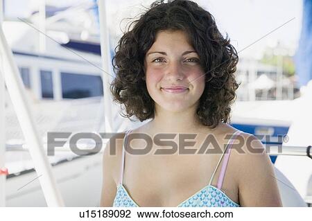 14 Year Old Girl at a Sailboat Helm. Victoria, BC. View Large Photo Image Stock Image - 14 Year Old Girl at a Sailboat Helm. Victoria, BC.. Fotosearch