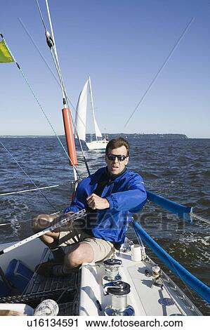 Stock Image - Sail racing, West Vancouver Yacht Club, West Vancouver, BC Canada. Fotosearch