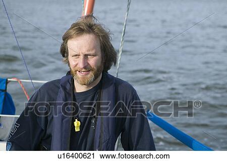 Stock Image - Sail racing, West Vancouver Yacht Club, West Vancouver, BC Canada. Fotosearch