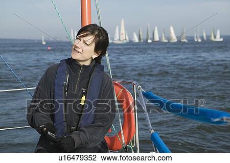 Stock Image - Sail racing, West Vancouver Yacht Club, West Vancouver, BC Canada. Fotosearch