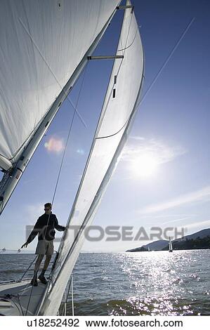 Stock Image - Sail racing, West Vancouver Yacht Club, West Vancouver, BC Canada. Fotosearch