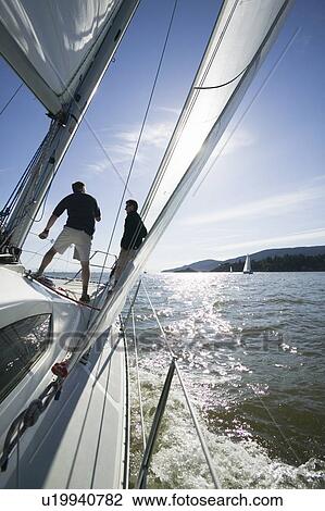Stock Image - Sail racing, West Vancouver Yacht Club, West Vancouver, BC Canada. Fotosearch