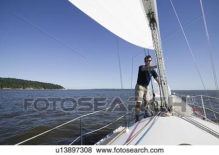 Stock Photo - Sail racing, West Vancouver Yacht Club, West Vancouver, BC Canada. Fotosearch