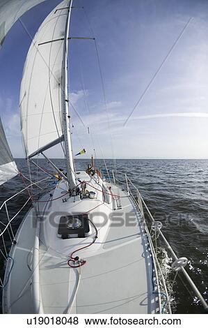 Stock Photo - Sail racing, West Vancouver Yacht Club, West Vancouver, BC Canada. Fotosearch