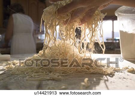 Stock Image - Making pasta at home, Okanagan Centre, BC Canada. Fotosearch