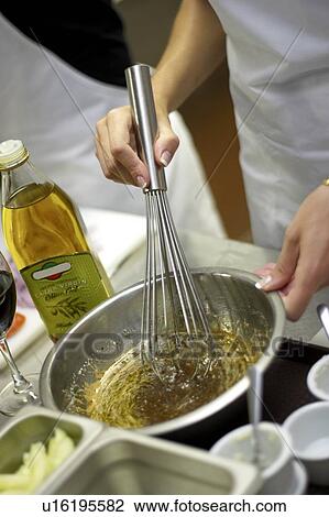 Person whisking bowl of olive oil with herbs and spices View Large Photo Image Stock Image - Person whisking bowl of olive oil with herbs and spices. Fotosearch