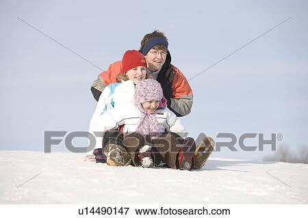 15, 13 and 9 year olds prepare to slide down hill, Winnipeg, Canada View Large Photo Image Stock Photo - 15, 13 and 9 year olds prepare to slide down hill, Winnipeg, Canada. Fotosearch