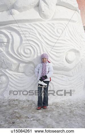 9-year old girl with skates beside snow sculpture, The Forks, Winnipeg, Canada View Large Photo Image Stock Image - 9-year old girl with skates beside snow sculpture, The Forks, Winnipeg, Canada. Fotosearch