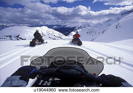 Stock Image - Snowmobiling, Whistler, BC, Canada. Fotosearch