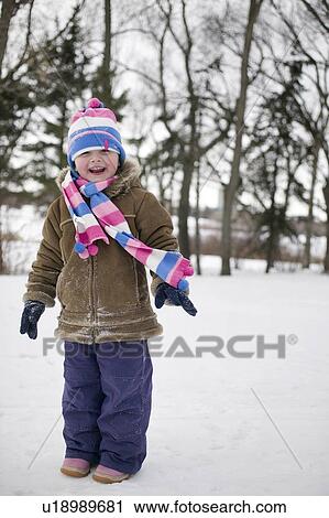 Young girl in winter hat and scarf, Regina, Saskatchewan, Canada View Large Photo Image Stock Image - Young girl in winter hat and scarf, Regina, Saskatchewan, Canada. Fotosearch