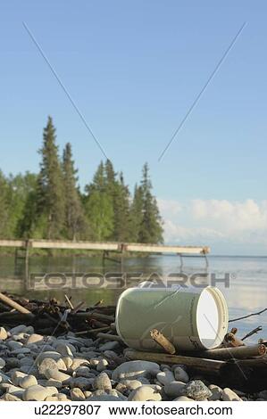 Corn-based compostable cup on shore, Clear Lake, Riding Mountain National Park, Canada View Large Photo Image Stock Photo - Corn-based compostable cup on shore, Clear Lake, Riding Mountain National Park, Canada. Fotosearch