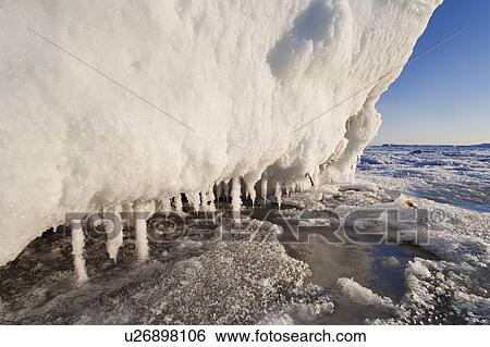 Stock Photograph - View of ice floe and St. Lawrence river, Cap-Chat, Gaspesie, Quebec. Fotosearch