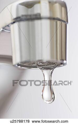 Water drips from kitchen tap. View Large Photo Image Stock Photo - Water drips from kitchen tap.. Fotosearch