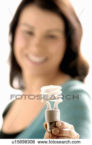 Young girl w/Light bulb, Regina, Saskatchewan View Large Photo Image Stock Photo - Young girl w/Light bulb, Regina, Saskatchewan. Fotosearch