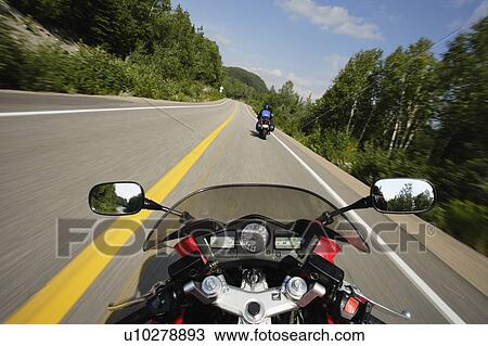 Stock Image - View on Motorcycle in action, Lanaudiere region, Quebec, Canada.. Fotosearch
