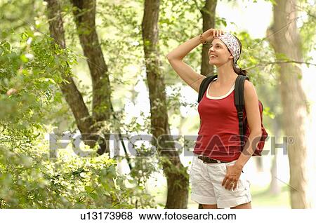 Woman hiking in woods, Regina, Saskatchewan View Large Photo Image Stock Photo - Woman hiking in woods, Regina, Saskatchewan. Fotosearch