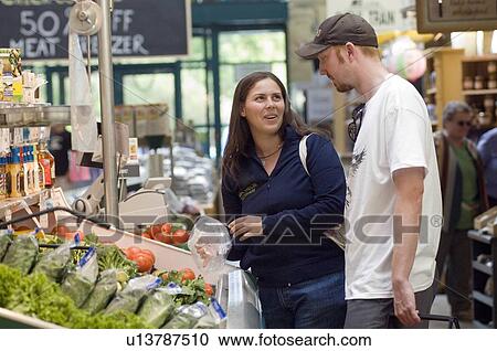 Caucasion young couple at an indoor vegetable market, Winnipeg, Canada View Large Photo Image Stock Image - Caucasion young couple at an indoor vegetable market, Winnipeg, Canada. Fotosearch