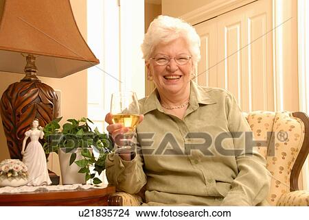 Picture - Senior Woman in chair, Regina, Saskatchewan. Fotosearch