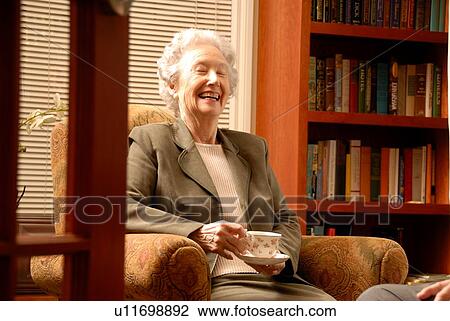 Senior Woman in Library; Canada, Saskatchewan, Regina View Large Photo Image Stock Image - Senior Woman in Library; Canada, Saskatchewan, Regina. Fotosearch
