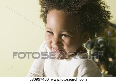 Stock Image - 3 year old Mulatto girl. Fotosearch