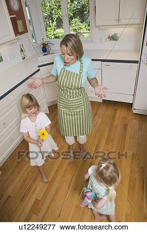 Stock Photo - Mom and playful girls, B. C.. Fotosearch