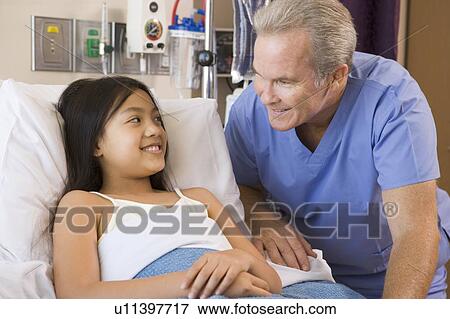Doctor Checking Up On Patient View Large Photo Image Stock Photo - Doctor Checking Up On Patient. Fotosearch