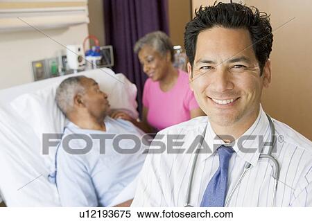 Doctor Looking Cheerful In Hospital Room View Large Photo Image Stock Photography - Doctor Looking Cheerful In Hospital Room. Fotosearch