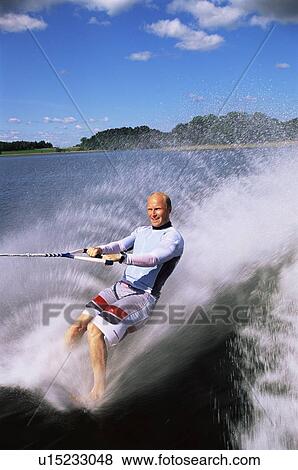 Man waterskiing barefoot View Large Photo Image Stock Photo - Man waterskiing barefoot. Fotosearch