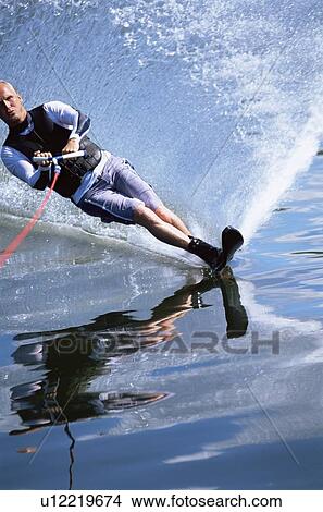 Picture - Man waterskiing. Fotosearch