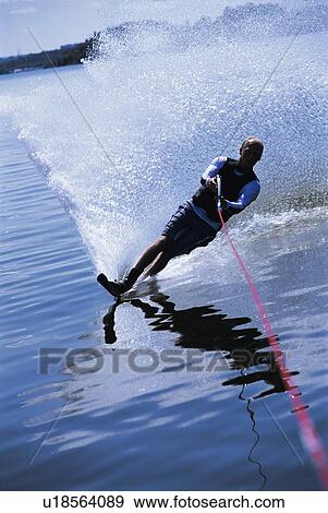 Stock Photo - Man waterskiing. Fotosearch
