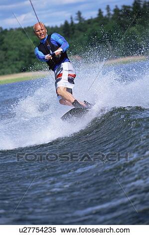 Man waterskiing View Large Photo Image Stock Photography - Man waterskiing. Fotosearch