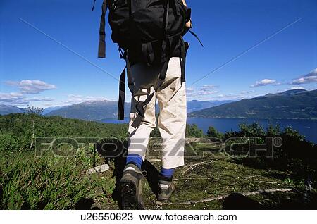 Woman's legs outdoors while hiking in scenic location View Large Photo Image Stock Image - Woman's legs outdoors while hiking in scenic location. Fotosearch