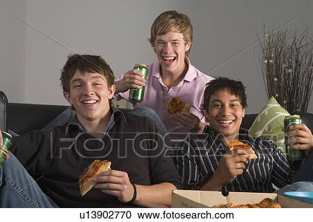 Teenage Boys Eating Pizza View Large Photo Image Stock Image - Teenage Boys Eating Pizza. Fotosearch