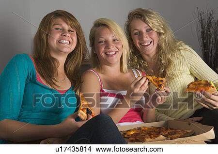 Picture - Teenage Girls Eating Pizza. Fotosearch