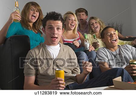 Teenagers Enjoying Drinks Together View Large Photo Image Stock Photo - Teenagers Enjoying Drinks Together. Fotosearch