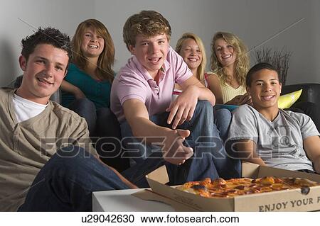 Teenagers Having Fun And Eating Pizza View Large Photo Image Stock Image - Teenagers Having Fun And Eating Pizza. Fotosearch