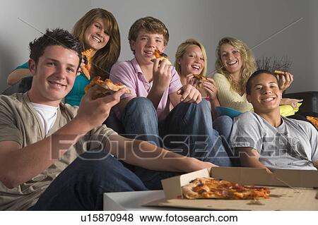 Teenagers Having Fun And Eating Pizza View Large Photo Image Stock Photo - Teenagers Having Fun And Eating Pizza. Fotosearch