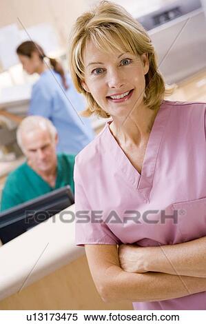 Nurses In The Reception Area Of A Hospital View Large Photo Image Stock Photography - Nurses In The Reception Area Of A Hospital. Fotosearch