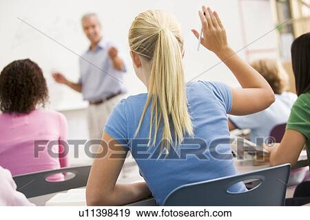 Students answering questions in math class with teacher View Large Photo Image Stock Photo - Students answering questions in math class with teacher. Fotosearch