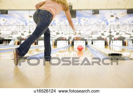 Woman bowling View Large Photo Image Picture - Woman bowling. Fotosearch