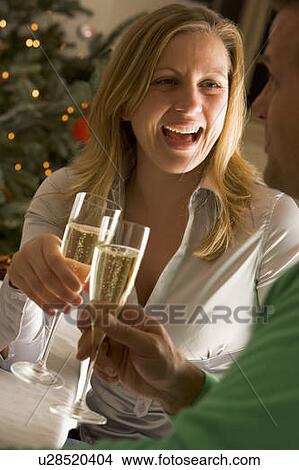 Picture - Drinking Champagne. Fotosearch