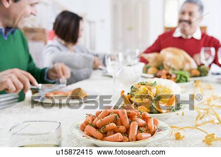 Family All Together At Christmas Dinner View Large Photo Image Stock Photography - Family All Together At Christmas Dinner. Fotosearch